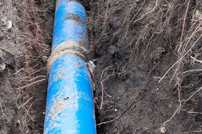Crew performing a sewer line belly repair spot fix in Portland